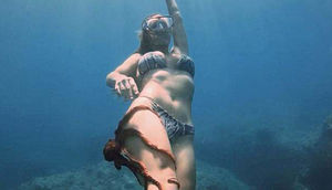 Su altında ayağına oktapod yapışdı - FOTO