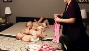 4 körpəsini geyindirən ananın mübarizəsi – VİDEO